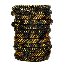 Load image into Gallery viewer, Handmade Black &amp; Gold Nepalese Bracelet
